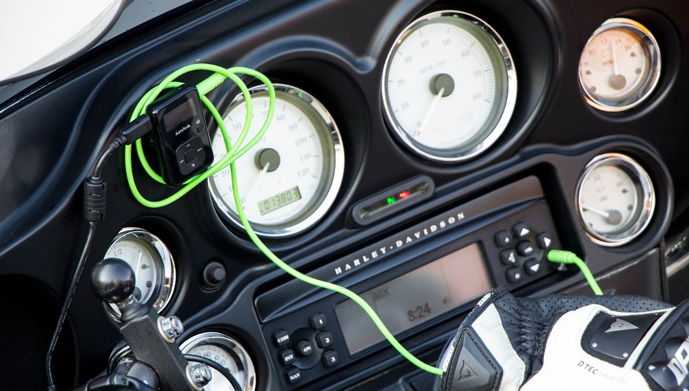 Is it OK to listen to music on a motorcycle?