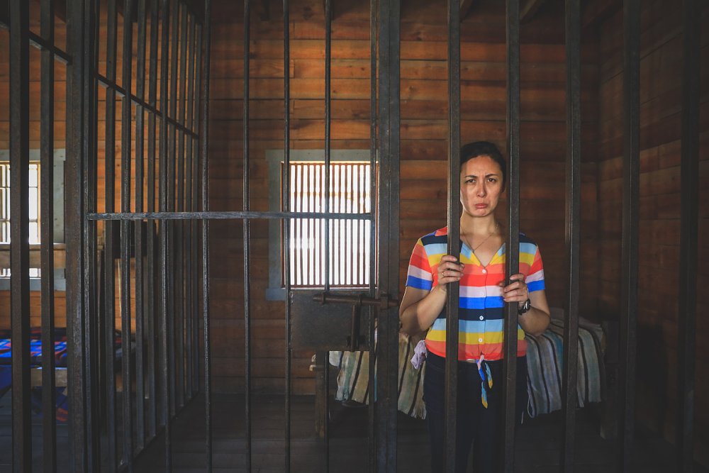 Kyra in the jail cell
