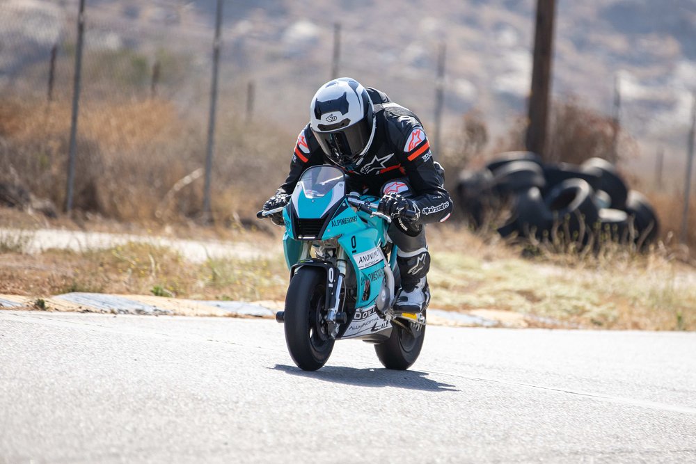 Ohvale GP-0 190 with rider on straightaway