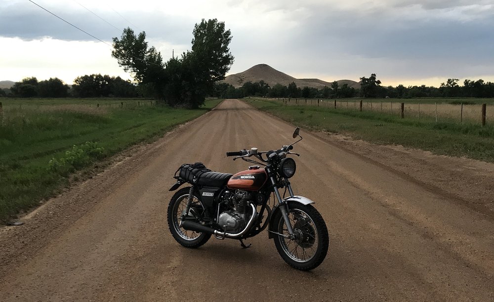 Honda CL360 on a dirt road