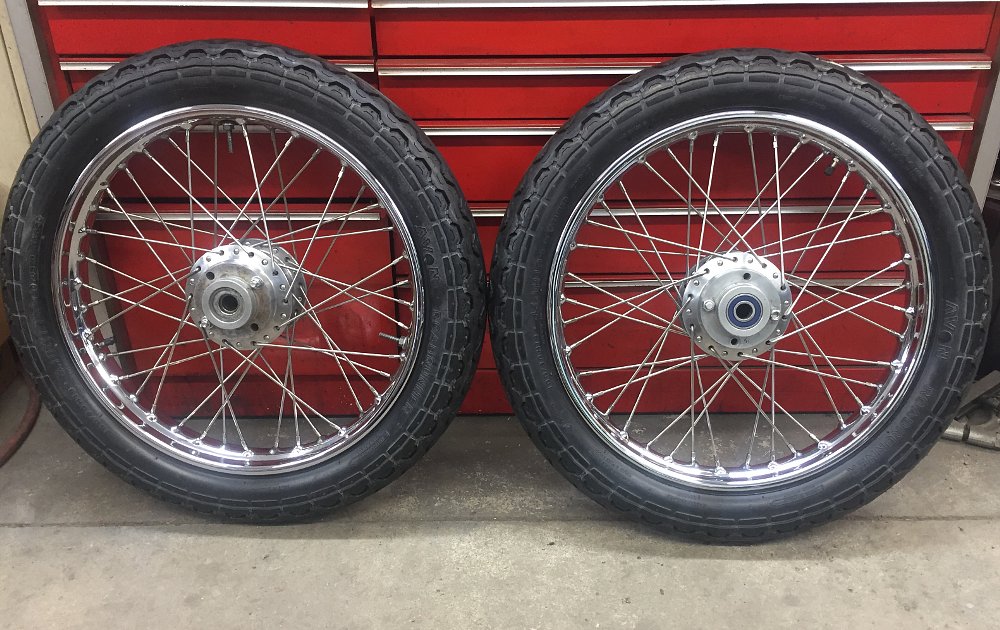 Triumph Trident wheels restored with Avon tires installed.