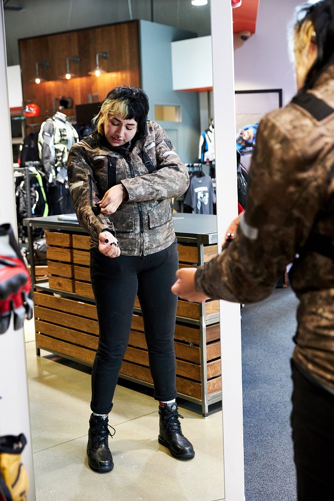 Amber tries on a jacket