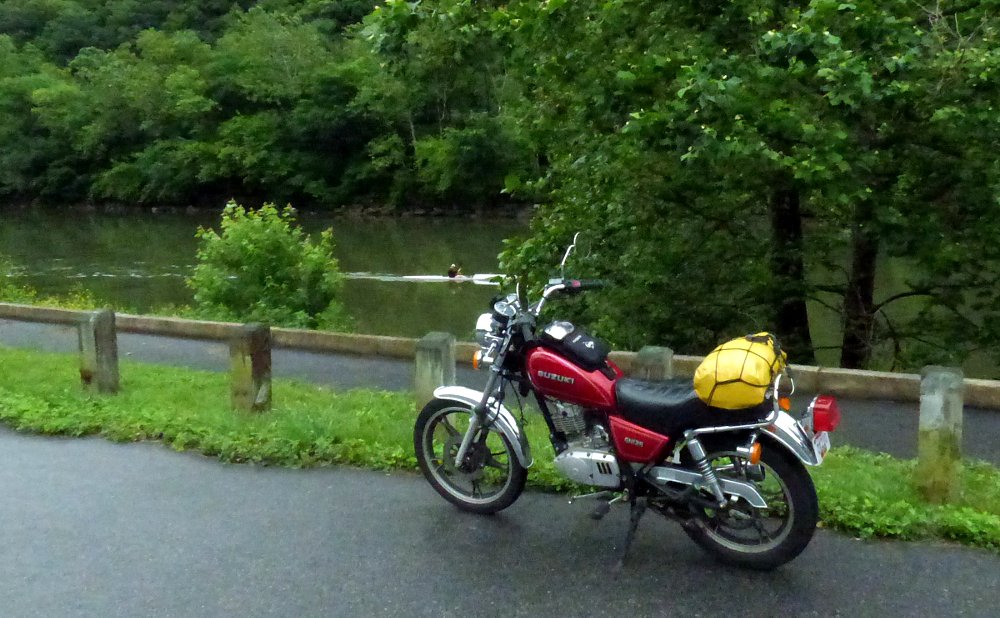 parked along the Juniata River as a kayaker glides past