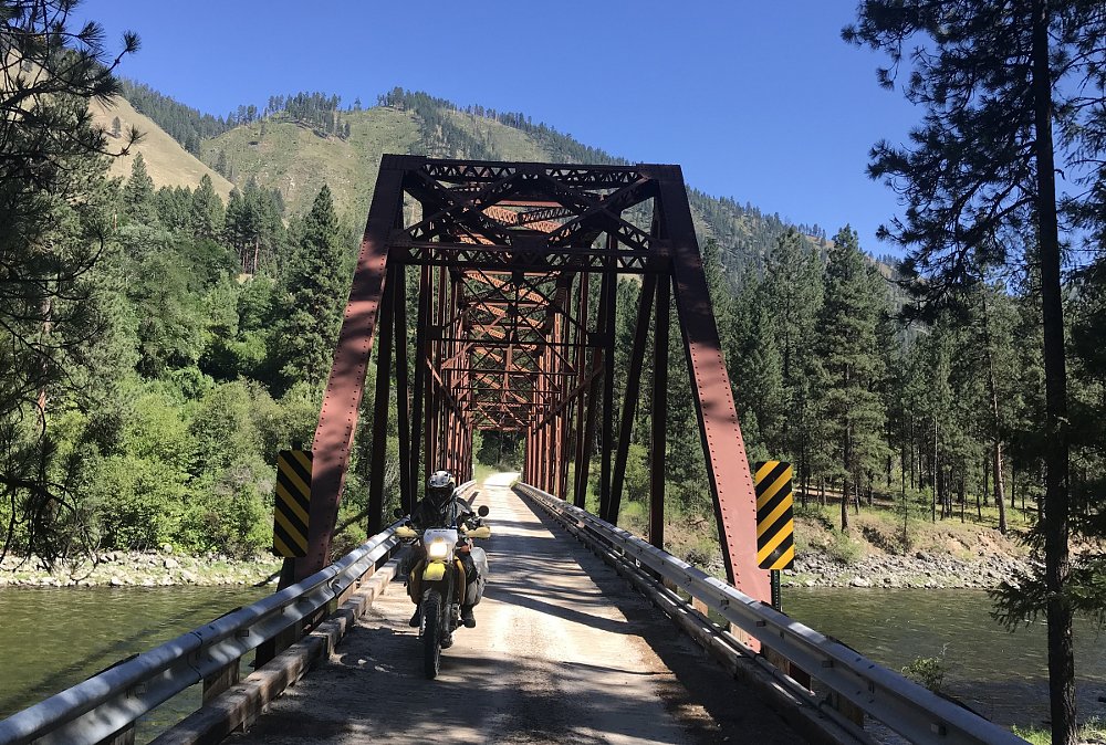 riding across a bridge
