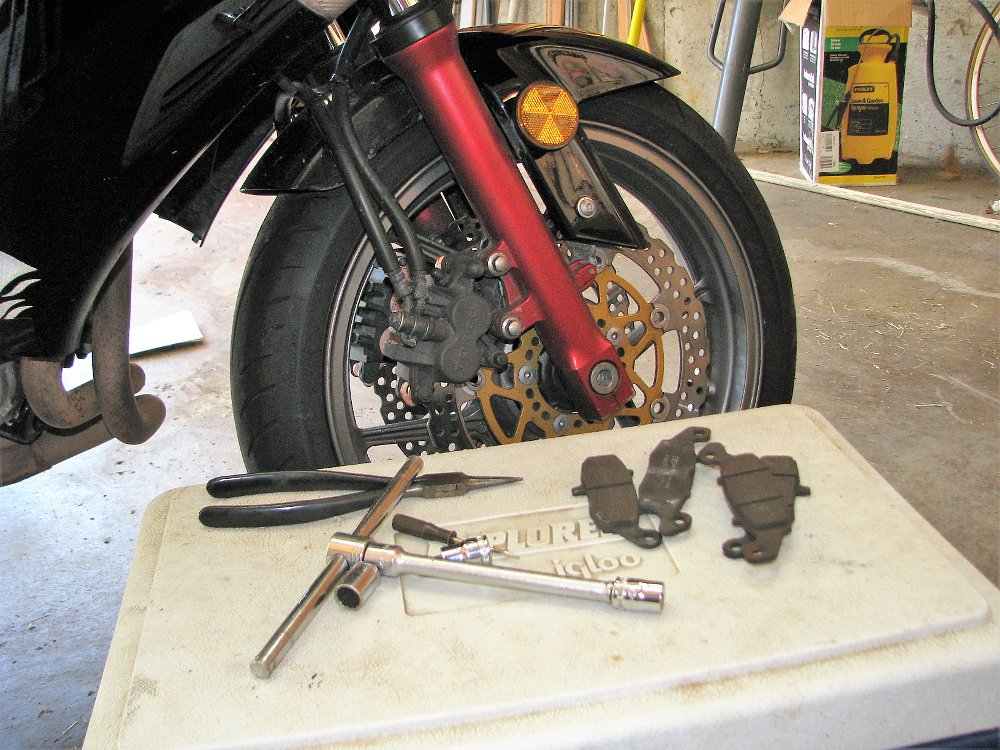 changing brake pads on the Ninja 650