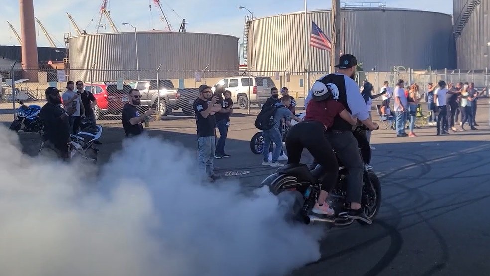 Police arrest organizer as thousands take over street for stunt riding in Connecticut