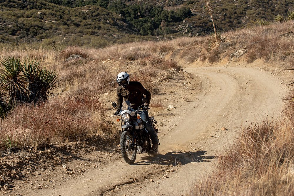 2022 Royal Enfield Himalayan riding on a dirt road