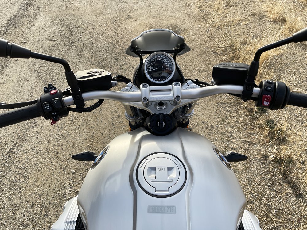 A close up view of the handlebar and instrument cluster on the BMW R nineT pure motorcycle