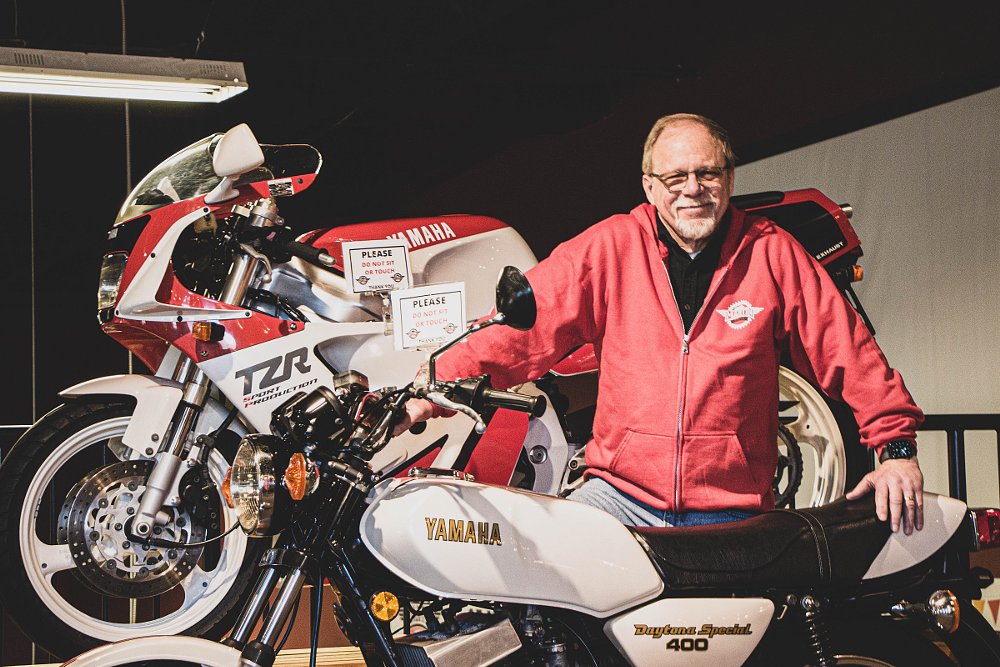 Dennis Martin with the collection of bikes he bought