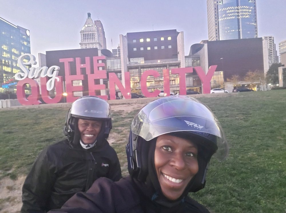 selfie in front of the Queen City sign in Cincinnati