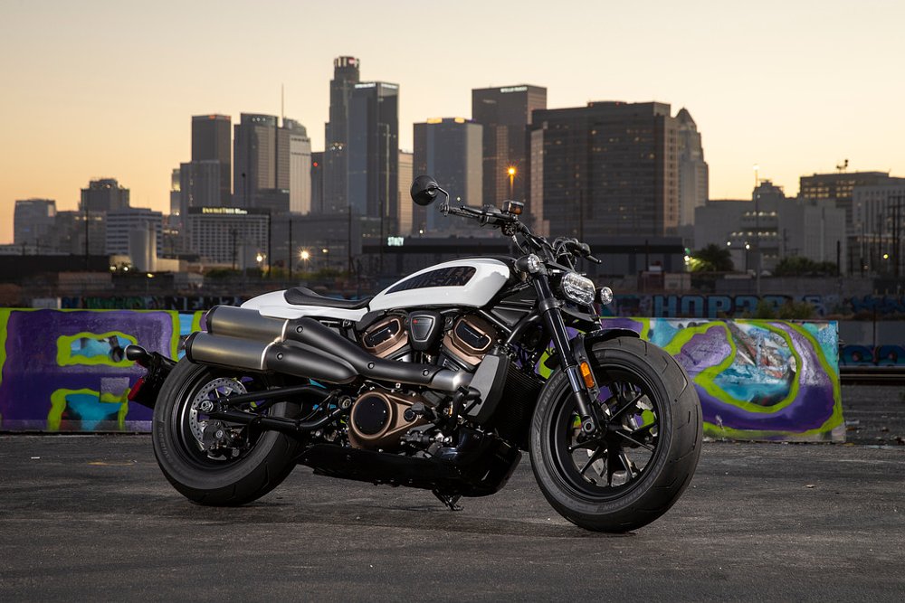 The Harley-Davidson Sportster S in white posted in front of the Los Angeles city skyline.