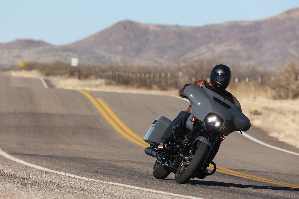 Harley-Davidson Street Glide ST riding on a desert road.