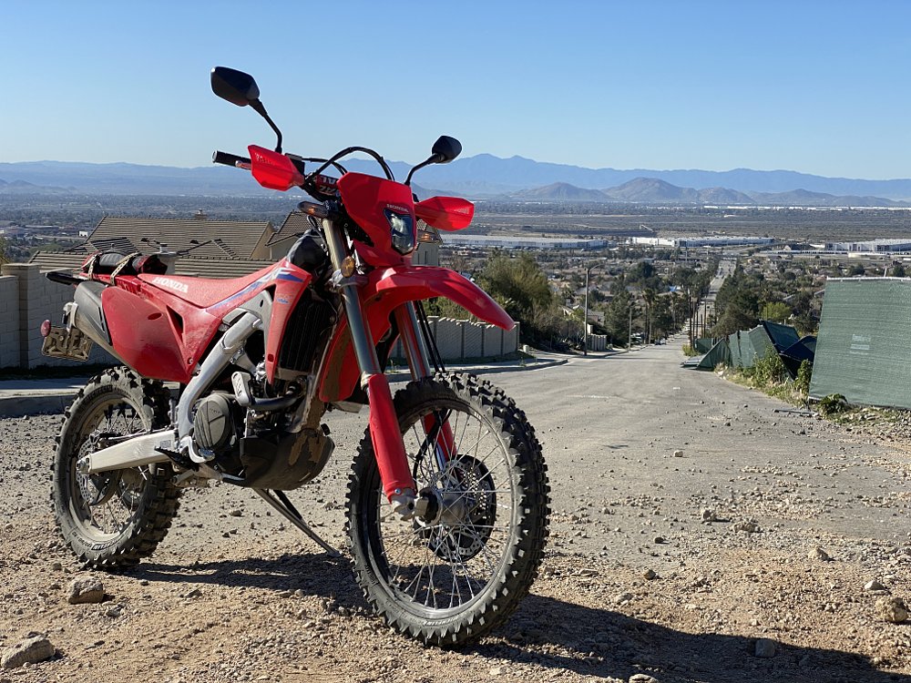 CRF450RL leaving pavement and getting into the dirt. 