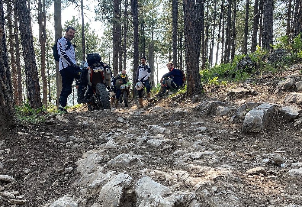 resting alongside a rocky trail