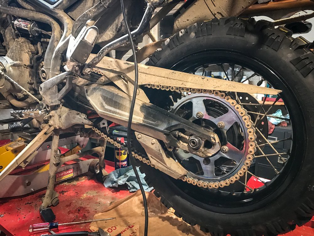 A clean motorcycle chain improves mileage