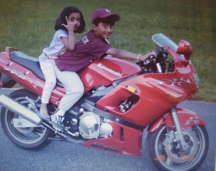 sister and brother sitting on a Kawasaki Ninja ZX-6