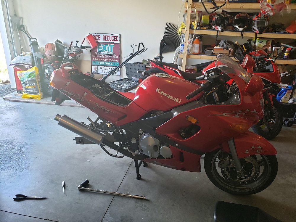 The Kawasaki ZX-6 partially disassembled in the garage