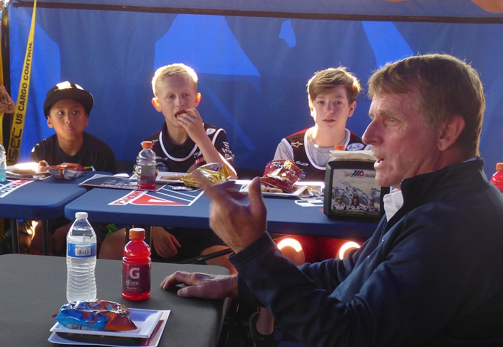Wayne Rainey talks with young racers