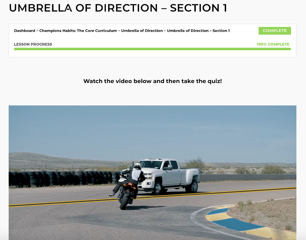screenshot of a video of rider avoiding a truck on the road