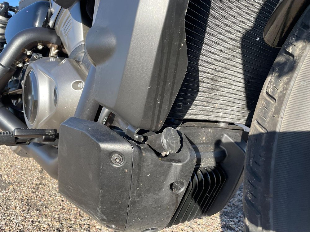 A close up view of the plastic skid plate on the Harley Davidson Nightster