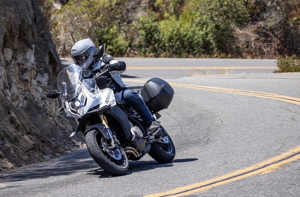 2022 CFMOTO 650 ADVentura on a twisty road.