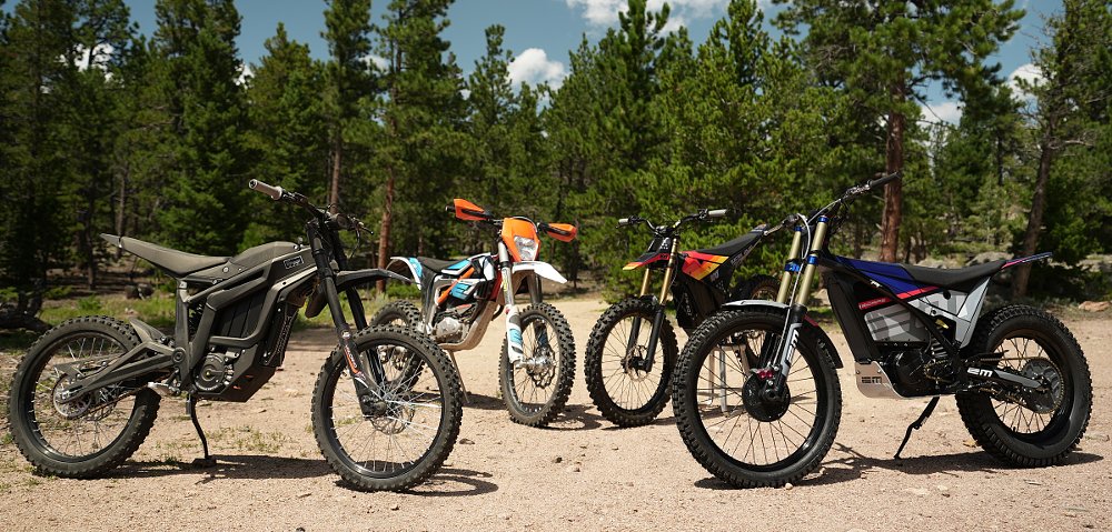 four electric dirt bikes