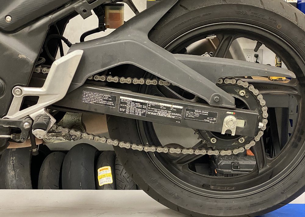 Loose motorcycle chain.