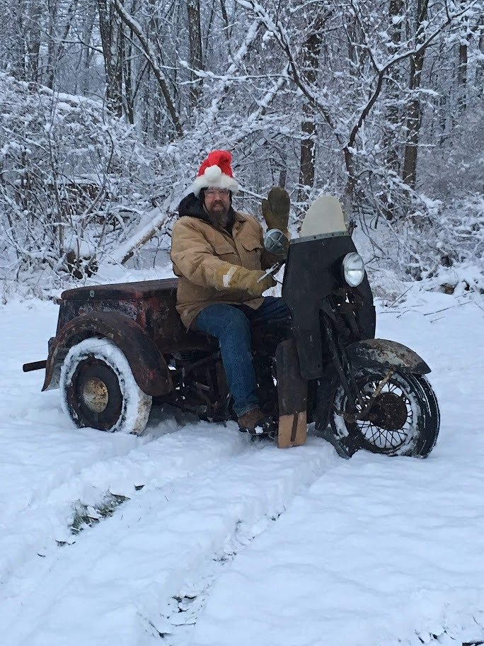 old Servi-Car three-wheeler in snow