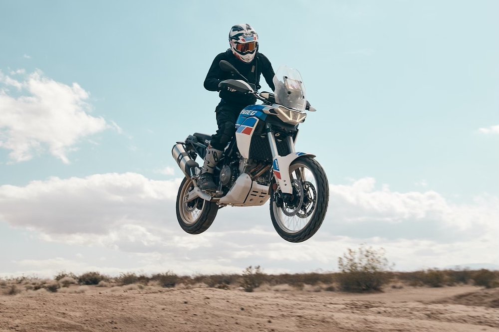 Aprilia Tuareg 660 in the air during a jump.