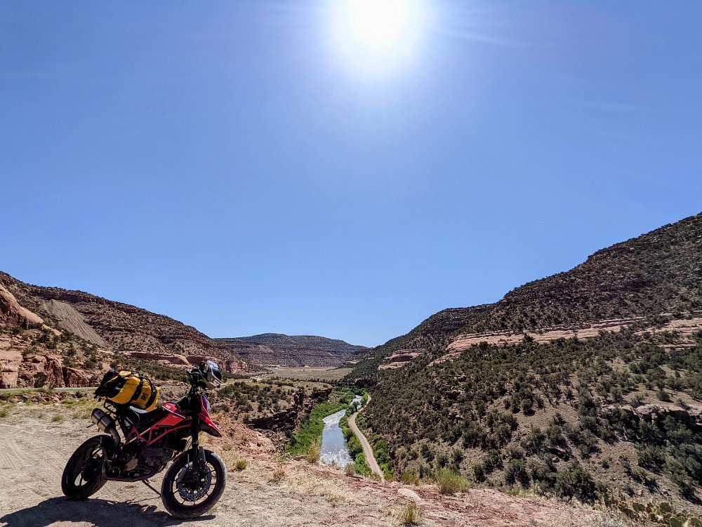 motorcycle parked above a canyon