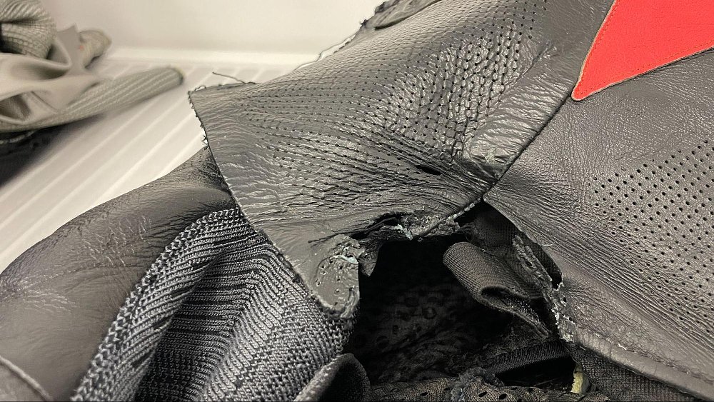 a close up photo of damaged leather