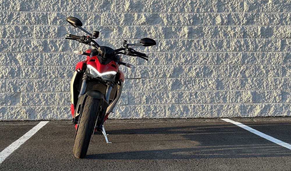 2023 Ducati Streetfighter V2 on its kickstand, shot directly from the front.