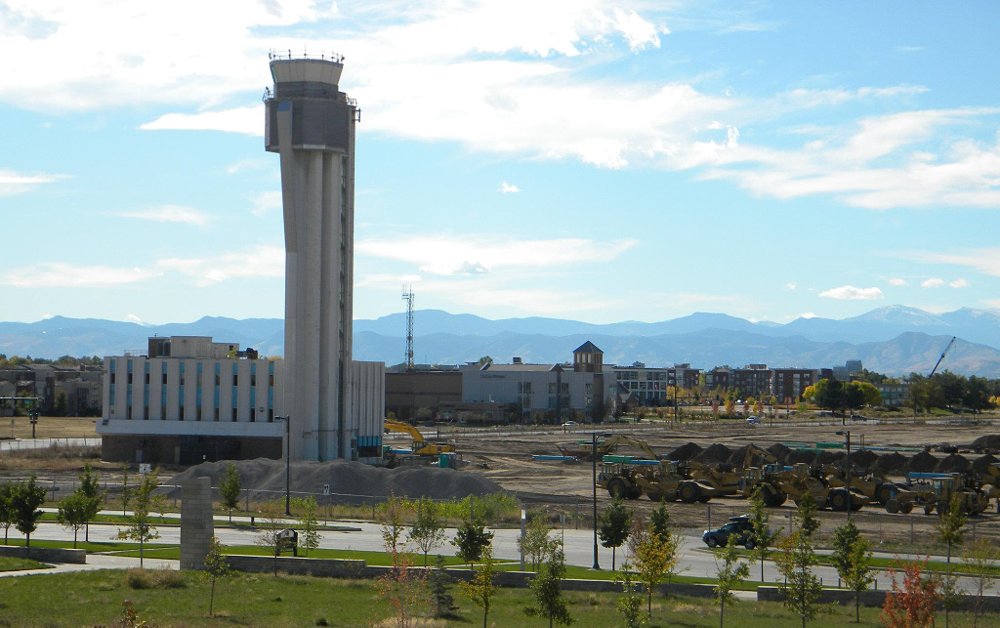 Tower standing in a residential, commercial neighborhood