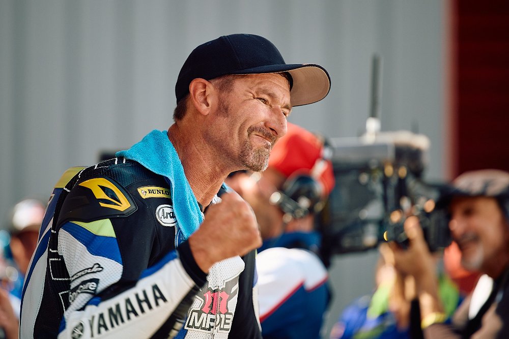 Smiling Josh Hayes celebrates a victory