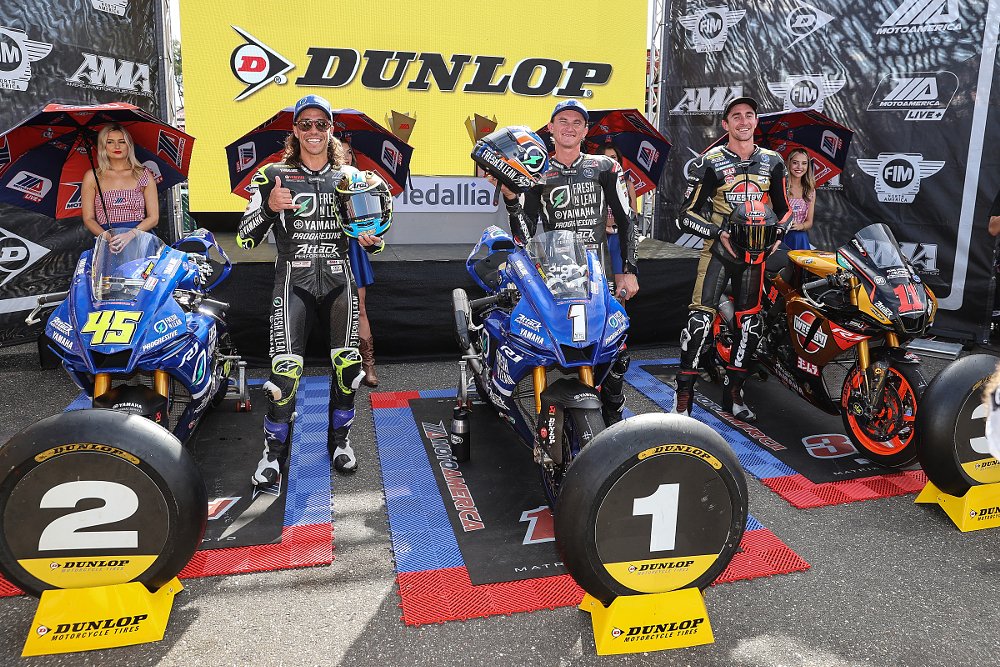 Superbike podium with three Yamaha riders