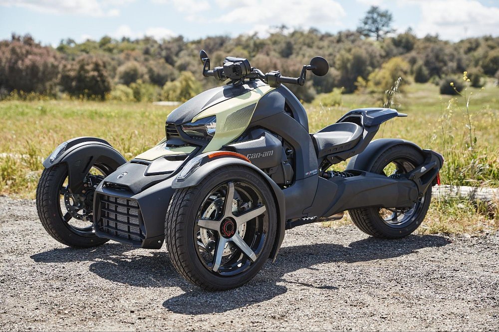 Jen riding down a straight road on the ryker
