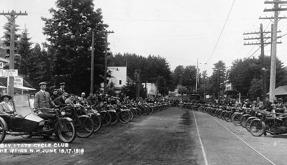 motorcyclists lined up for black and white photo