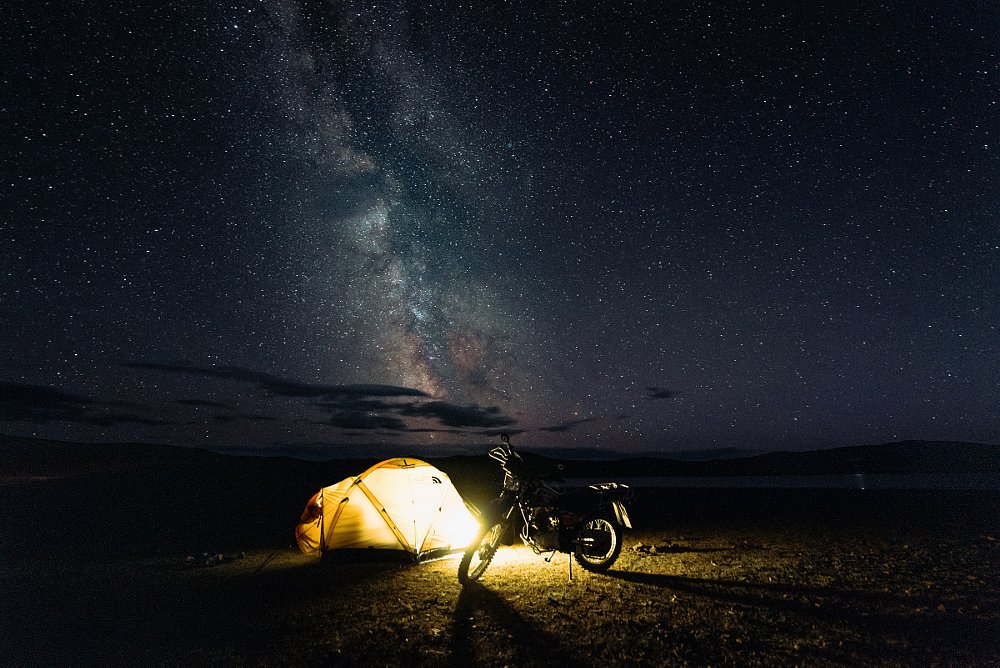 tent under night sky in Mongolia