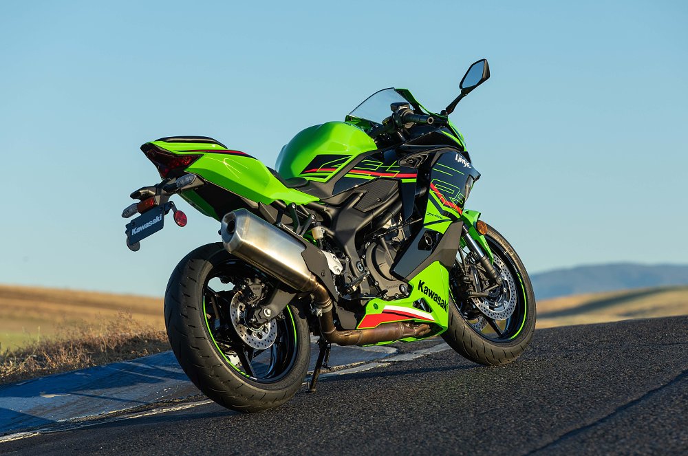 2023 Kawasaki ZX-4RR rear-right three quarter beauty, parked on a race track.