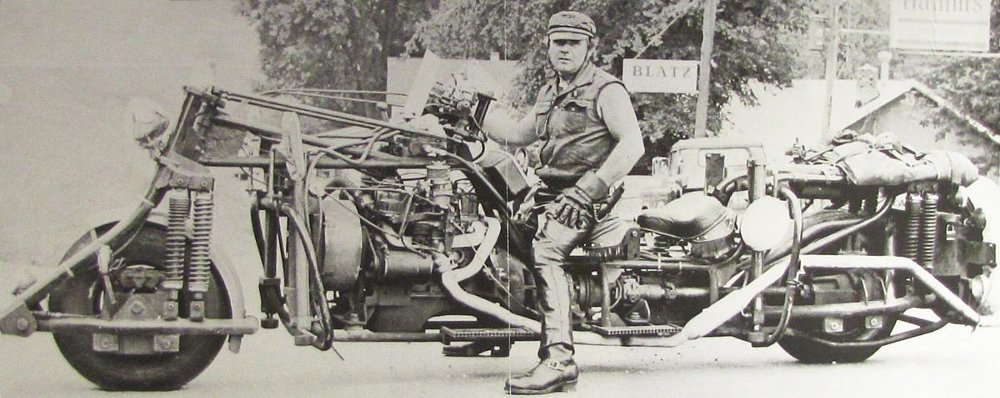 Black and white photo of Gelbke sitting on RoaDog