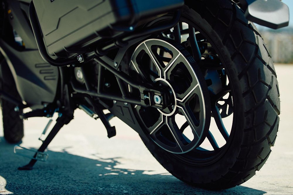 A close up view of the rear sprocket on the belt drive of the RX1E