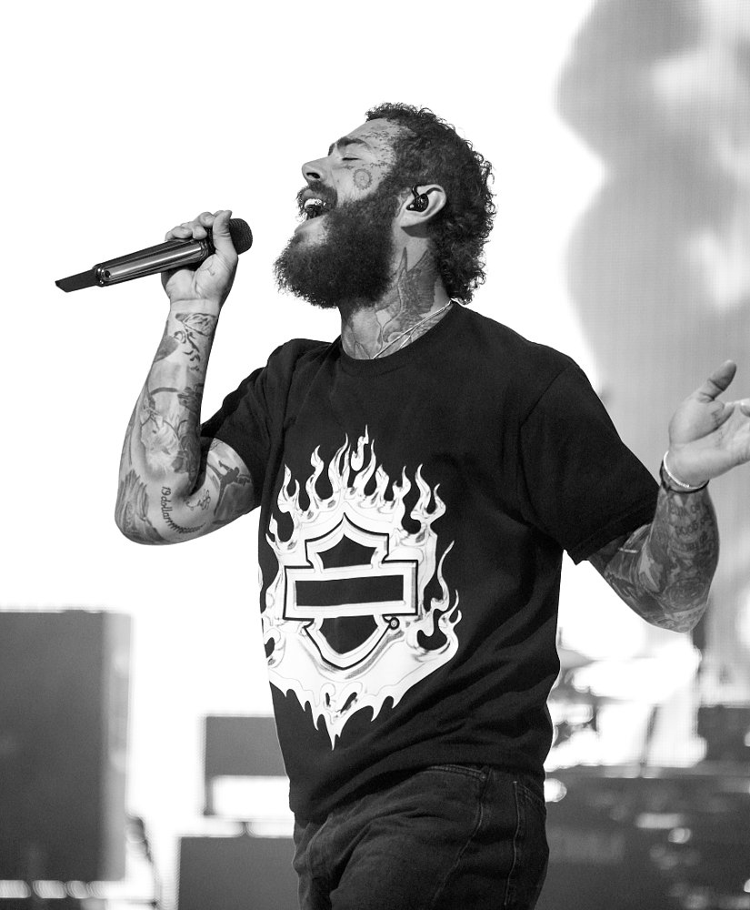 Post Malone in concert wearing a new Harley-Davidson chrome logo T-shirt
