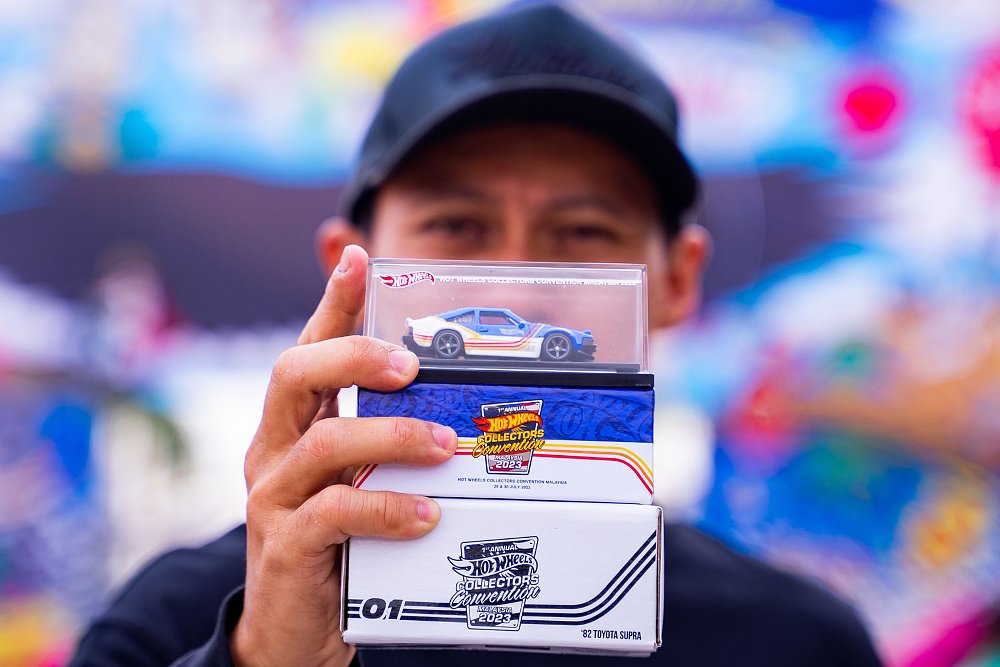 collector shows off a Hot Wheels car