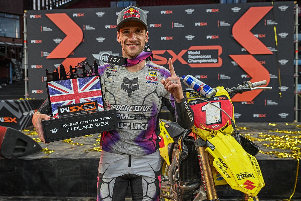 Ken Roczen holds the trophy for winning the British GP
