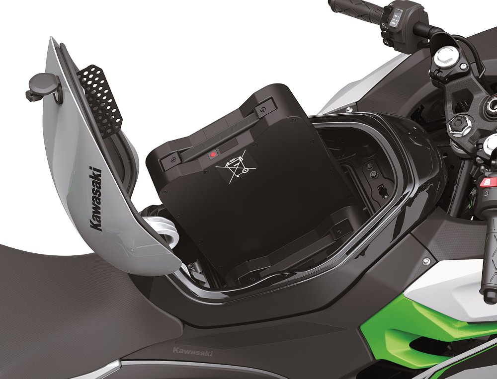 batteries being removed from under faux fuel tank