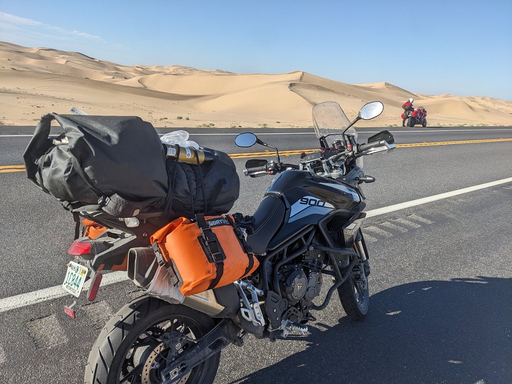 The Tiger 900 and the Honda VFR800 along a desert road