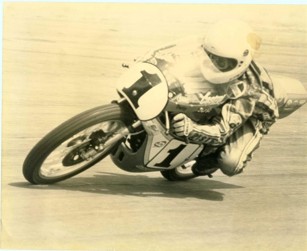 Old photo of Dylan riding the MT125
