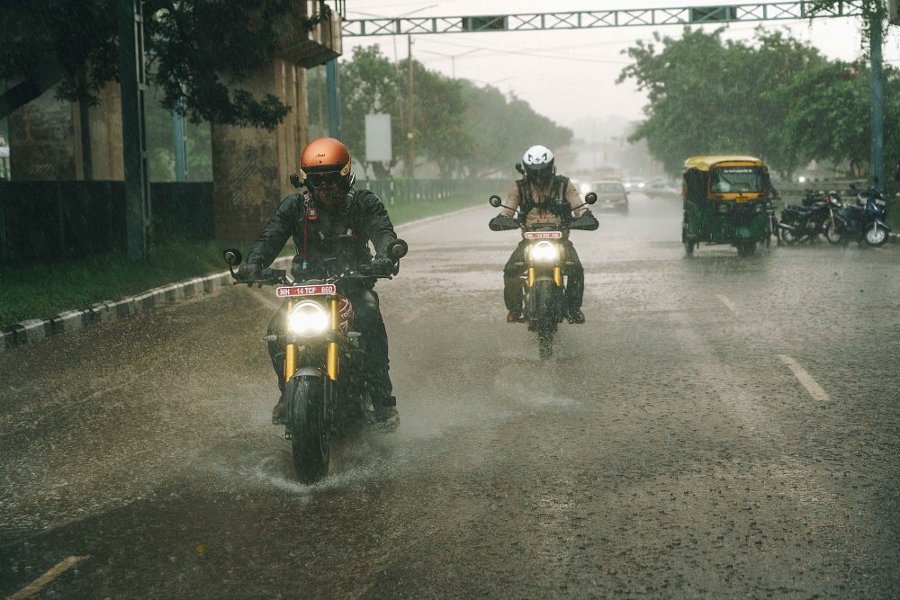 Triumph's Speed 400 and Scrambler 400 X ride through a rain storm in Chandigarh, India.