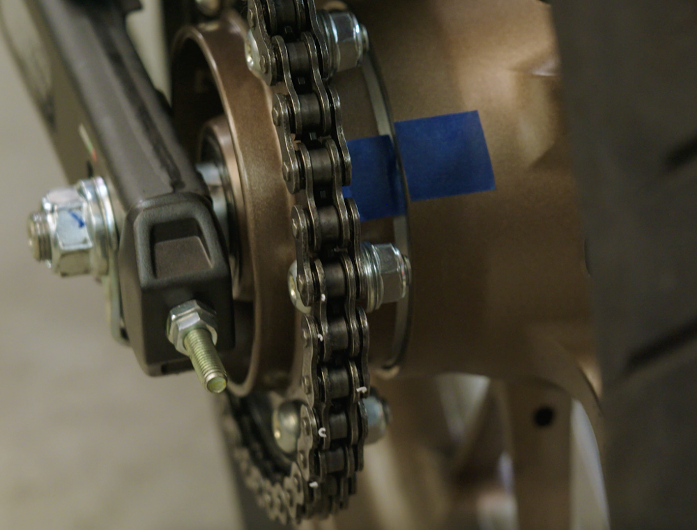 Checking cush drive freeplay with the wheel on the motorcycle