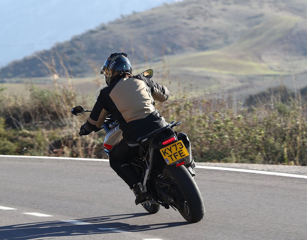 rear view of the Triumph Tiger 900 GT Pro on the road